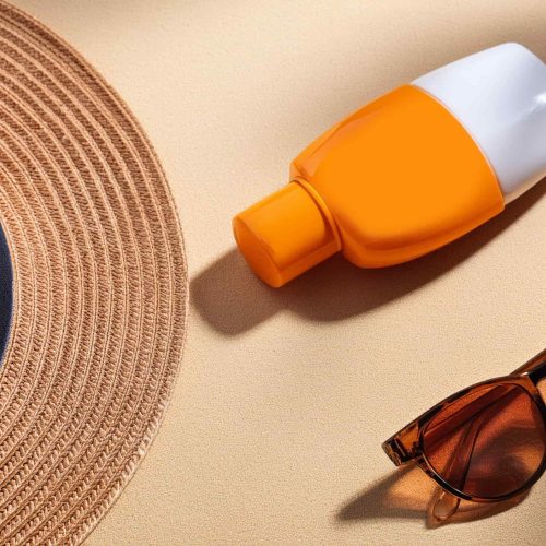Waterproof sunscreen and polarized sunglasses to protect against sun exposure on the boat